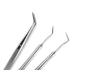 Dentist's tools on white background