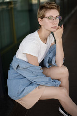 Fototapeta premium Portrait of beautiful young woman wearing glasses.