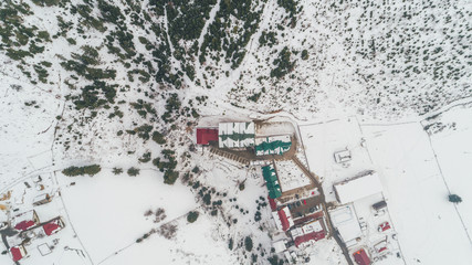 Aerial view of the buildings in the mountains. Bukovel. Carpathians. Winter. Snow.