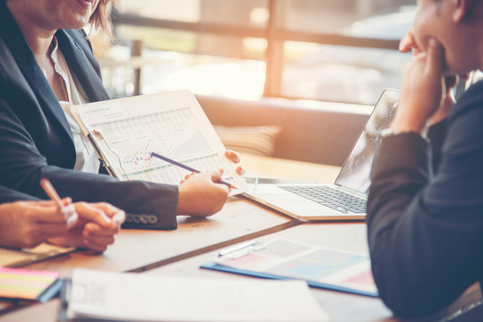 Marketing team collaboration brainstorming and discussion how to increasing profit effectively highest performance in the next quarter of company in the conference room Business Teamwork Concept.