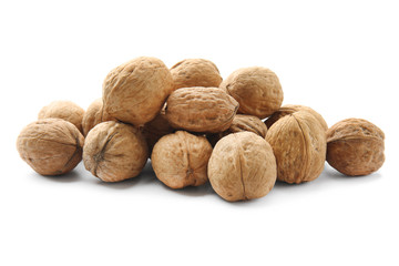 Tasty walnuts on white background