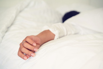 Young man sleep in bed in the bedroom.