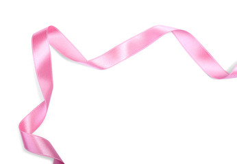 Curled pink ribbon on white background