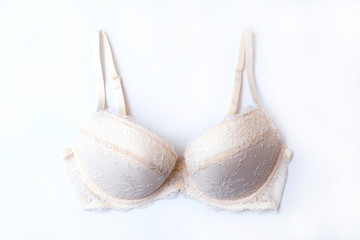 Beige push up bra isolated on white background, top view