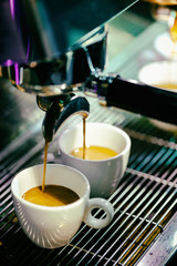 espresso shot from coffee machine in coffee shop,Coffee maker in coffee shop