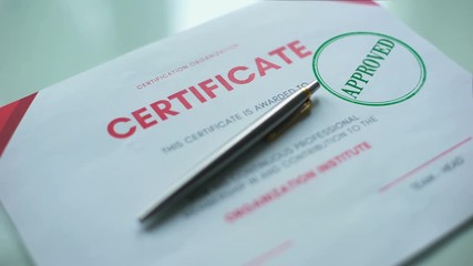 Certificate document approved, hand stamping seal on official paper, validation