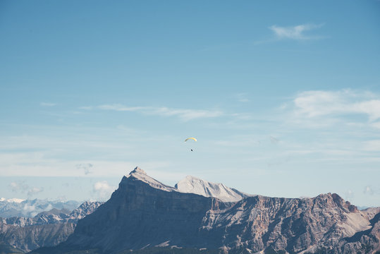Paragliding over the peaks of the Dolomites