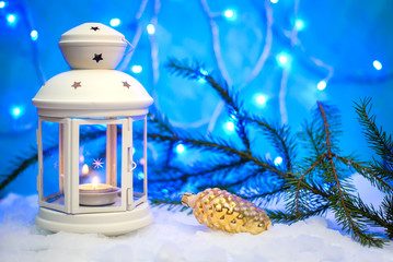 Beautiful Christmas picture with a lantern and a glass cone