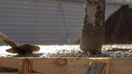 Concreting builders poured fresh, high-quality concrete close up