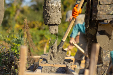 Concreting builders poured fresh, high-quality concrete close up