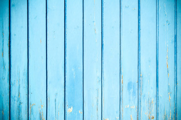 weathered blue painted garage door background with vignetting