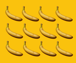 Banana pattern on colored background.Banana with sharp shadows on color background. Colorful poster with bananas on colored background