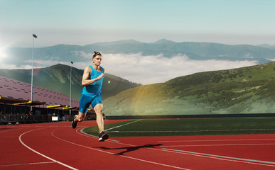 man running in the track. Fit male runner jogging during training at stadium tracks. The athlete,...