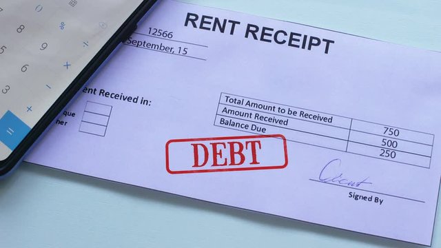 Rent receipt document debt, hand stamping seal on official paper, bankruptcy