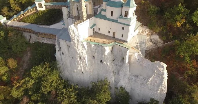 Orthodox Lavra in the forest on the slopes of the river banks. Ukraine. Svyatogorsk
