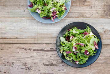 Healthy food. Fresh green salad with spinach,arugula,romaine and lettuce