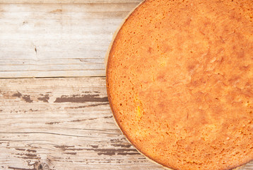 Casic sponge cake Pan di Spagna selective focus. Homemade cake. Dessert cooking. Copy space.