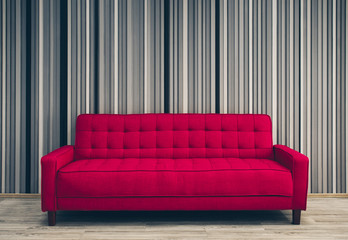 big red sofa in studio