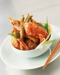 Tempura vegetables in white bowl
