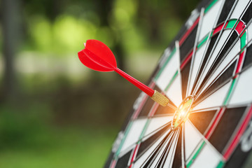 dartboard target center with arrows, idea of financial and business goal, using as background