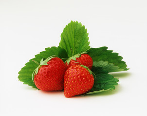 Strawberries on white, close-up.