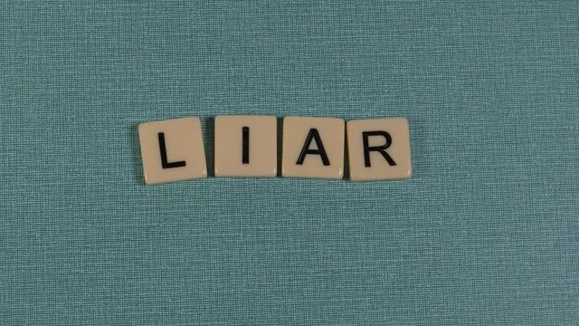 Animation with letters forming the word LIAR.