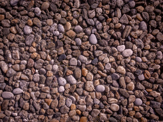 Wall with gravel stones facade.