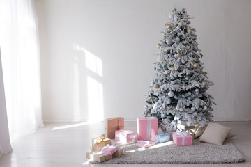 Christmas Decor white room with the Christmas tree and gifts