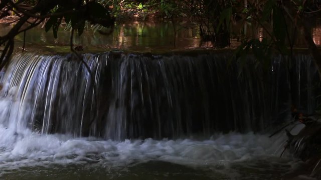 HD Video Amazing waterfall in wonderful autumn forest, beautiful waterfall in rainforest 