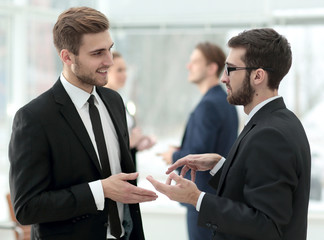 business colleagues talking in the office