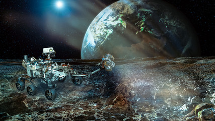 Rover on the Mars. Collage. Earht planet on the backstage. Elements of this image furnisfurnished by NASA.