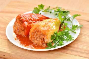 Stuffed pepper with meat, rice and carrots. Healthy food. Restaurant dish.