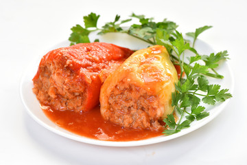 Stuffed pepper with meat, rice and carrots. Healthy food. Restaurant dish.