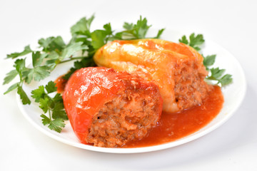 Stuffed pepper with meat, rice and carrots. Healthy food. Restaurant dish.