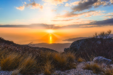 romantic view from the mountain at sunset