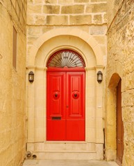 Fototapeta na wymiar Red door in Malta