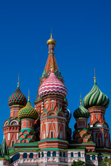 Fototapeta na wymiar Saint Basil's Cathedral (Sobor Vasiliya Blazhennogo) is a church in Red Square. Onion Domes. Moscow, Russia