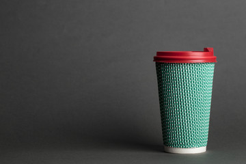 coffee in a disposable glass with a lid