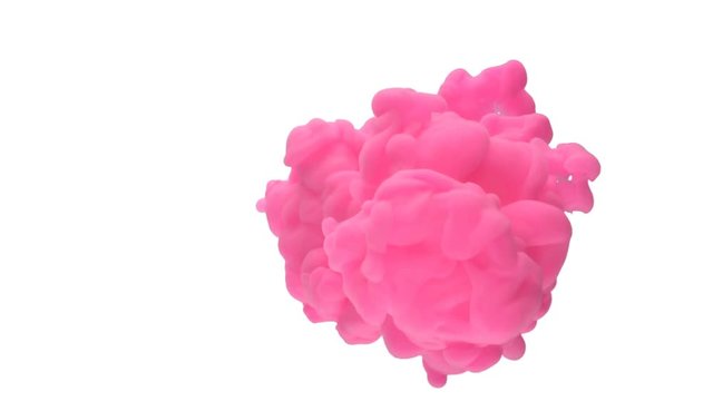Pink ink dropped in water on white background

