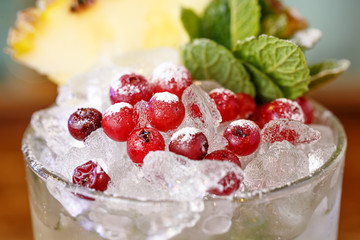 Close-up of cranberries on ice