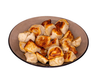Fried dumplings isolated on white.