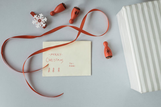 Writing Christmas cards and wrapping Christmas presents