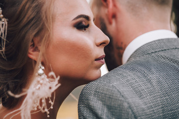Portrait photo of a couple.Wedding photo.Young wedding couple fell in love at summer