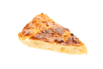 Slice of delicious, traditional Bulgarian breakfast, called Banitsa or Banica, isolated on white background. Banitza is made of filo dough with whisked eggs and white cheese filling between the sheets