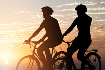 Fototapeta na wymiar Couple Riding Bicycle