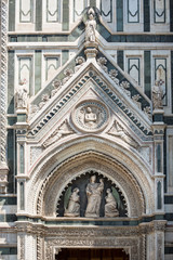 Fototapeta na wymiar Door arch detail from Giotto's bell tower in Florence, Italy