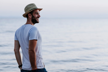 Man enjoying sunset by the sea
