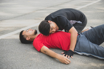 Asian man heart attack during running in park need CPR