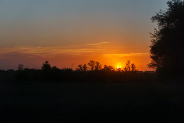 Fototapeta na wymiar Orange Sunset Landscape