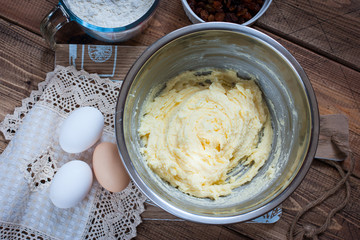 Step-by-step preparation of a raisin cake - mixing the necessary ingredients, top view